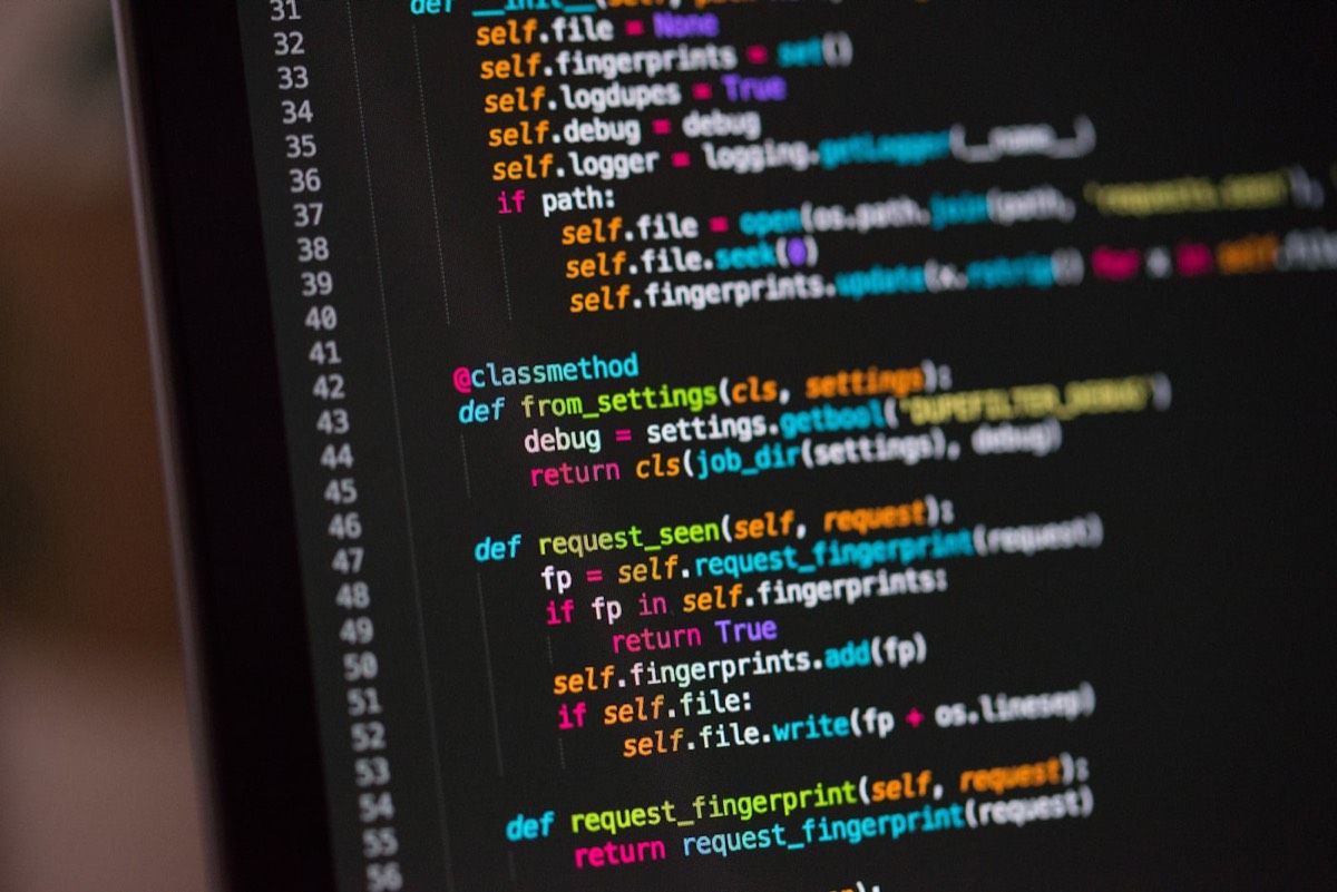 Close-up of website code on a computer screen during a technical SEO audit